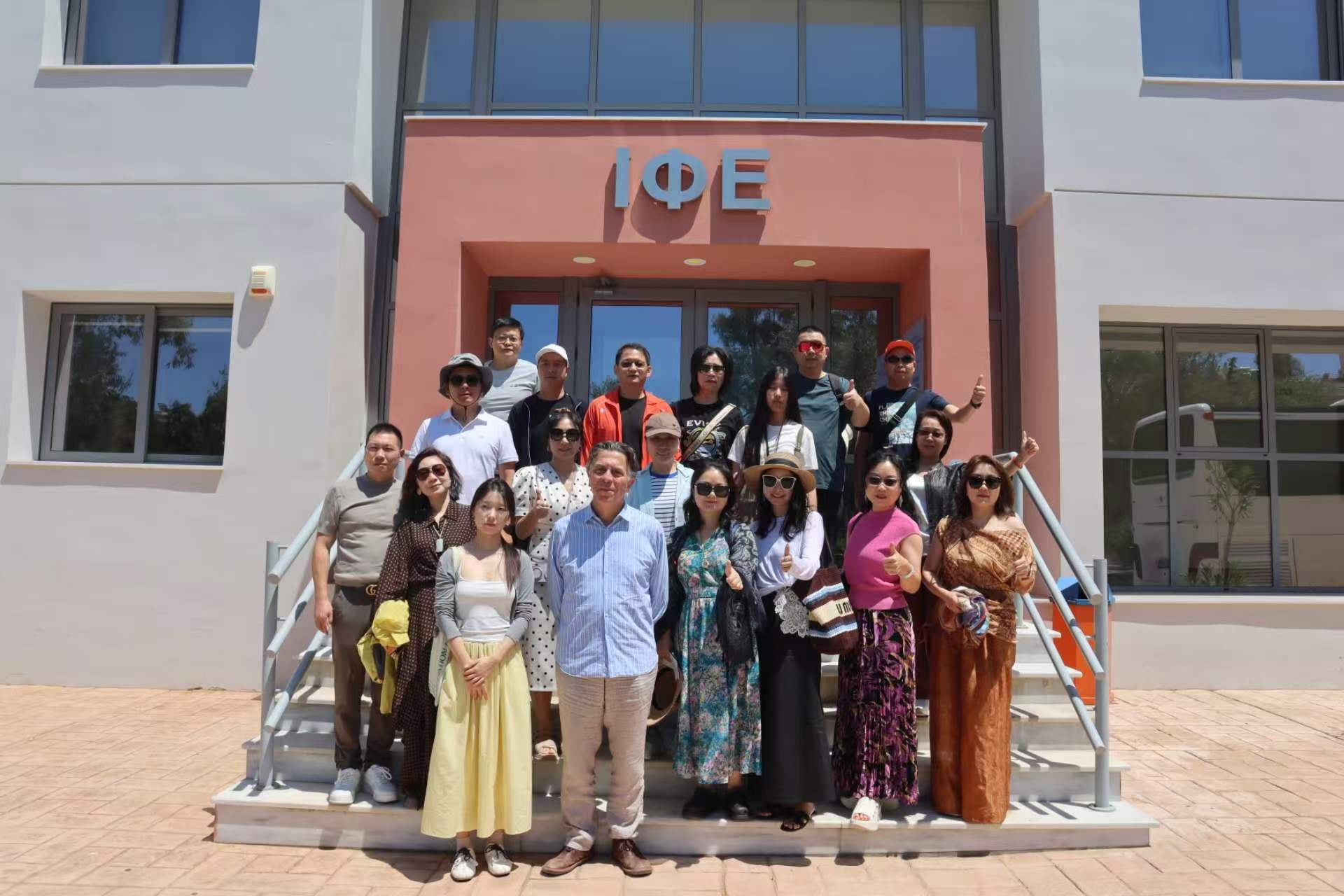 Participants in the cultural programme outside an Athens academic venue